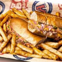 Cubano · Ham, pulled pork, melted cheese, brewhouse mustard toasted on sub roll and topped with chopp...