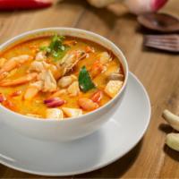 Shrimp Tom Yum · Classic spicy sour soup prepared with fresh caught prawns,mushrooms  and traditional spices.