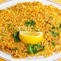 Chicken Biryani · Basmati rice and chicken cooked with Indian herbs and saffron.