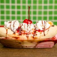 Banana Split · Classic: comes with a scoop of strawberry, vanilla, and chocolate topped with strawberry top...