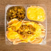 Nacho Large · Round yellow corn chips loaded with gourmet nacho cheese and jalapenos (please indicate if y...