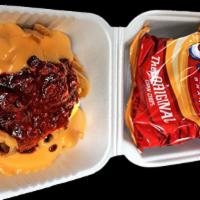 Frito Pie · Frito chips with chili (no meat) and cheese (touch of Jalapeno). Please indicate if you want...
