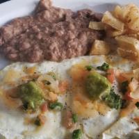 Huevos Rancheros · Eggs of your choice over ranchero sauce.