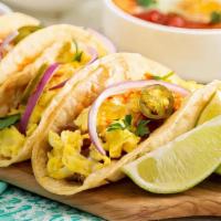 Breakfast Tacos (2) · Still undecided? Go for this one, zero risk. Two classic scrambled egg tacos with your choic...
