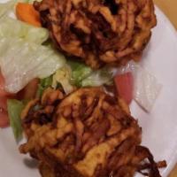 Onion Bhaji (2 Pieces) · Onion fritters battered with chickpea flour.