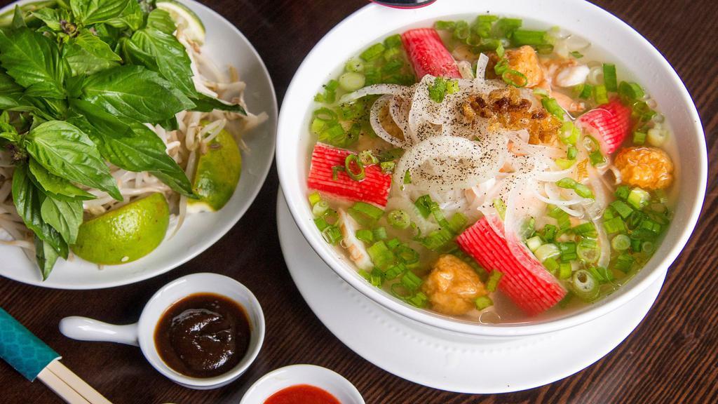 Seafood Pho · 430 Calories peeled shrimps, fish balls, imitation crab meats served with chicken broth.