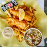 Fish 'N Chips · Beer battered cod on a bed of fries with homemade tartar sauce and coleslaw.