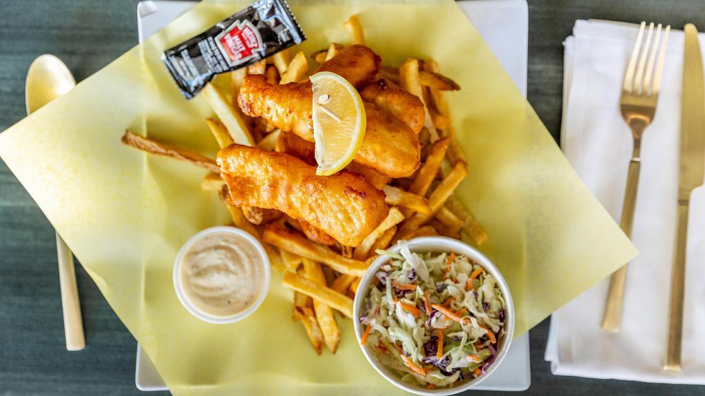 Fish 'N Chips · Beer battered cod on a bed of fries with homemade tartar sauce and coleslaw.