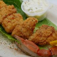 Rockfish Bites · Chunks of Maryland's most loved fish hand-dipped and deep-fried. Served with cocktail or tar...