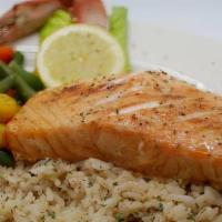Honey Glazed Salmon · Sautéed salmon covered in sweet honey, served on top of dirty rice with a side of broccoli.