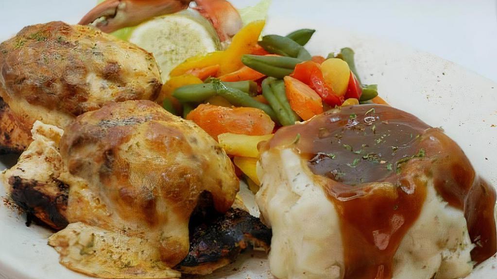Chicken Chesapeake · Grilled chicken breast stuffed with a petite crab cake and topped with imperial sauce.