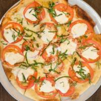 Margherita Pizza · Mozzarella, Parmesan, Extra Virgin Olive Oil, Sliced Vine Ripe Tomatoes, Fresh Mozzarella an...