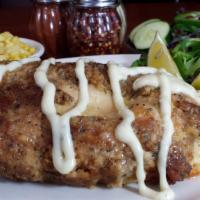 Stuffed Chicken With Crab Meat · stuffed with jumbo lump crab meat and cheese topped with brandy sauce. Served with 2 sides.