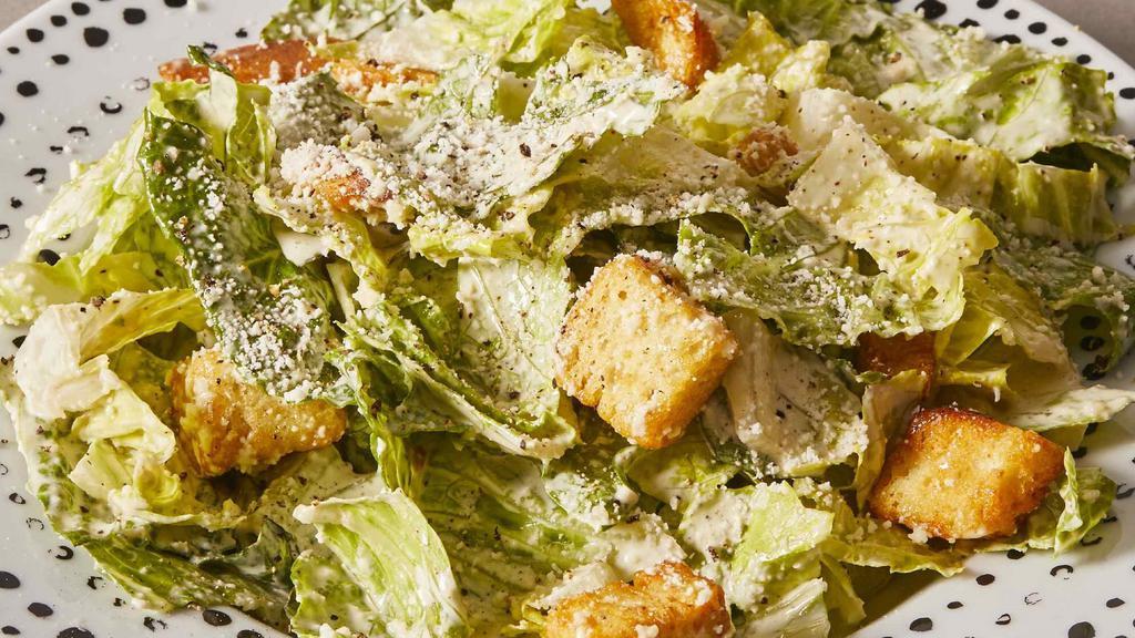 Caesar Salad · chopped romaine, Caesar dressing, garlic-parmesan crumble. add chicken or shrimp for additional charges.