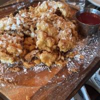 Funnel Cake · with raspberry rum sauce