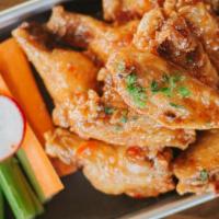 Chicken Wings · Choice of Buffalo, BBQ, Garlic Parmesan or Plain
