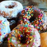 Mixed Dozen · Includes 6 small and 6 large or specialty donuts.