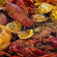 The Ultimate Feast Combo · 1 lb snow crab, one lobster tail (1 piece), 1 lb shrimp (head off), one lb crawfish, one lb ...
