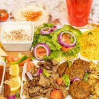 Tri Borough Combination Platter · Cubes of lamb and beef gyro, chicken gyro and falafel served with our specially seasoned ric...