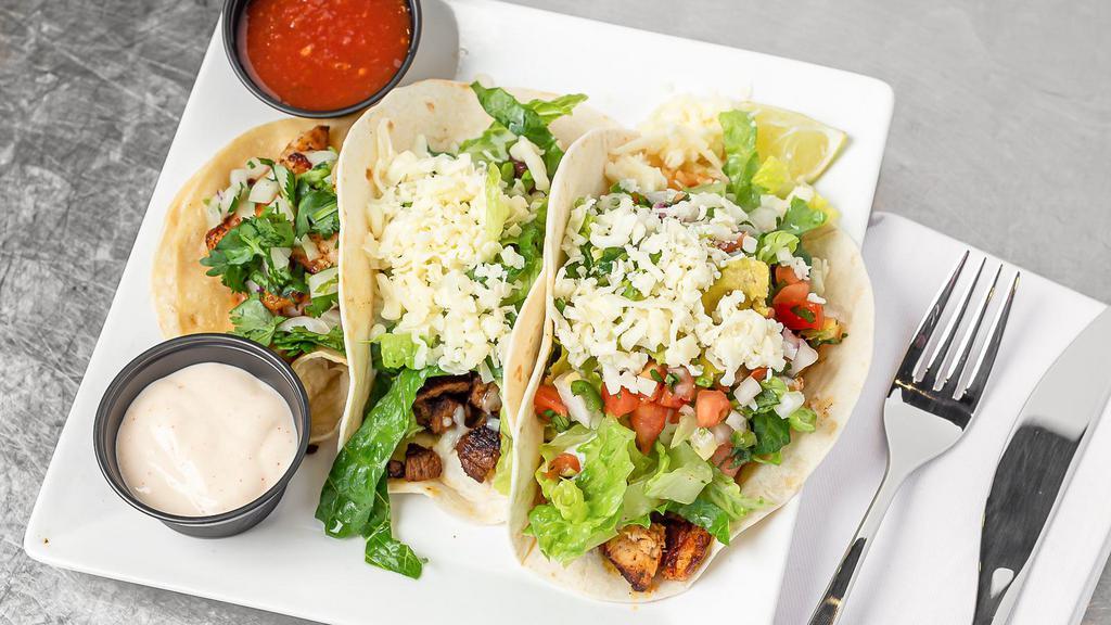Stilo Americano · Crispy or soft, topped with choice of meat, lettuce, and cheese. Single Taco (One taco Only)