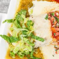 Tri-Color Burrito · Stuffed with carnitas, grilled onions, rice and beans. Topped with green tomatillo sauce, en...