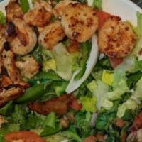 Echo Fresco Salad · Grilled shrimp and chicken over fresh greens, accompanied by pico de gallo, red onion. tomat...