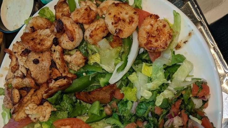 Echo Fresco Salad · Grilled shrimp and chicken over fresh greens, accompanied by pico de gallo, red onion. tomato, bell pepper, served with a cheese quesadilla and ranch dressing.