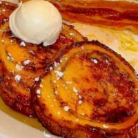 French Toast · Served with creamy butter and syrup.