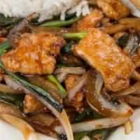Mongolian Chicken · Chicken with white and green onion sautéed in a sweet & savory Mongolian sauce.