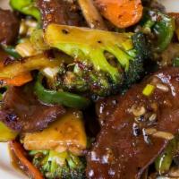 Jalapeño Beef · Spicy.
Beef with mixed veggies and jalapeños sautéed in a spicy brown sauce.