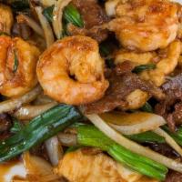 Fbs4. Mongolian Delight · A combination of chicken, shrimp, and beef with white and green onion sautéed in a sweet & s...