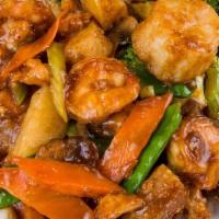 Fbs7. Happy Family Delight · A delicious combination of chicken, shrimp, beef, and scallops with mixed veggies in a savor...