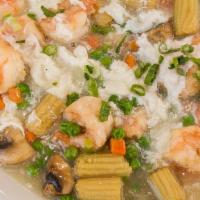 Fbs11. Shrimp In Lobster Sauce · Shrimp with mixed veggies sautéed in a divine lobster sauce. A perfect mix of light and savo...