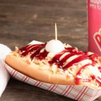 Famous Perro (Colombian Style Hot Dog) · Our signature Colombian style hot dog with a pork frank, mustard, mayo, ketchup, crumbled qu...