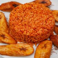 Jollof Rice · Seasoned rice cooked in tomato and bell pepper puree. no meat included.