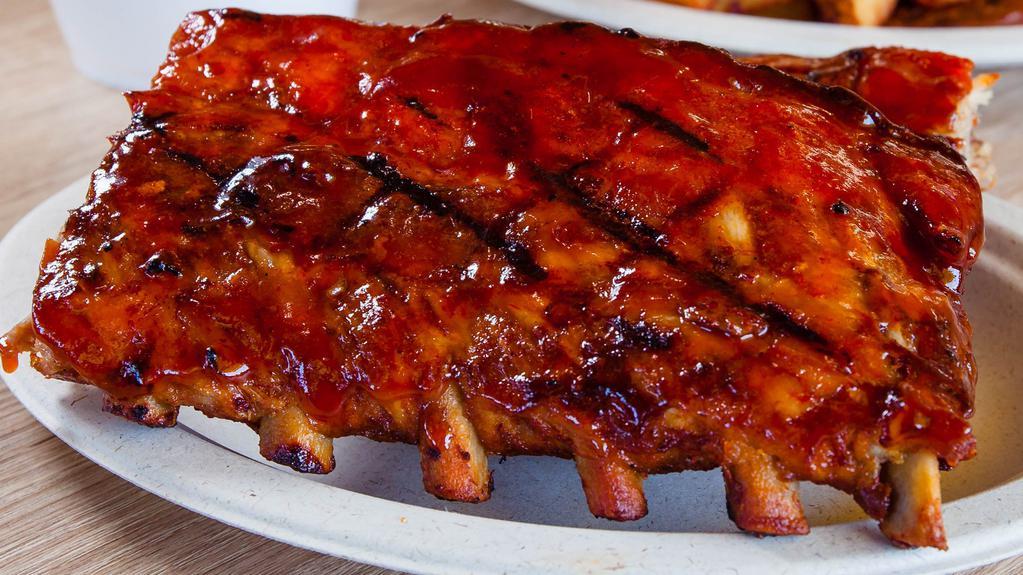 Rib (Snack - 4 Bones) · Served with one side and a roll.