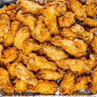 Wing Dings (Pan) · As shown: regular, BBQ and hot and spicy wings. Feeds approx 12 people.
