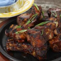Chipotle Smoked Ribs (5) · 5 Slow roasted baby back ribs, chargrilled and basted with our spicy chipotle BBQ sauce.