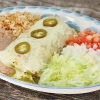 Chicken Burrito · Flour tortilla filled with grilled chicken, frijoles, Jack cheese, covered with green tomati...