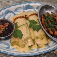Spinach & Artichoke Enchiladas · Fresh spinach, artichoke, Jack cheese topped with roasted chile cream sauce or green tomatil...