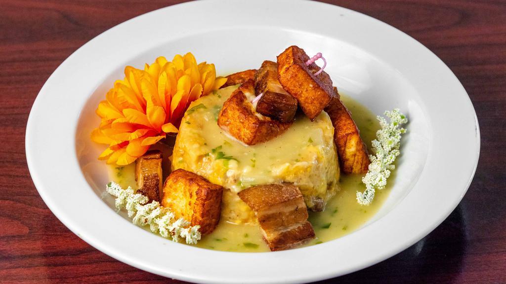 Mofongo · Deep fried plantains mashed with garlic, chicken broth and salt and served with your protein choice of chicken, shrimp, or steak (churrasco) and topped with your choice of sauce.