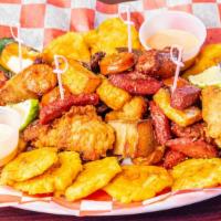 Dominican Platter · Assorted chef's choice of meat, plantains and other traditional Dominican bite sized appetiz...