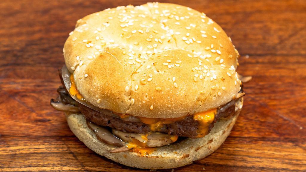 Gimme A 'Hell Yaa' Burger · 5 oz. Pattie, sautéed mushrooms, provolone cheese & boom boom sauce.
