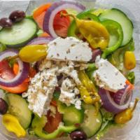Greek Salad · Fresh garden salad with black olives pepperoncini and Feta cheese.