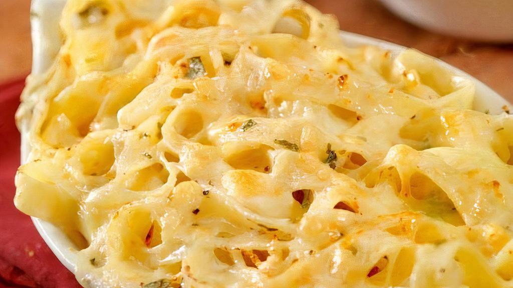 Fettuccine Alfredo · A large serving of fettuccine smothered in a creamy. Alfredo sauce topped with 3 cheese blend and baked. to perfection. 11.95 +Add chicken, crab, or shrimp