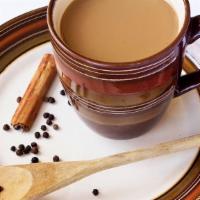 Masala Tea · Black tea with a mixture of aromatic Indian spices and herbs