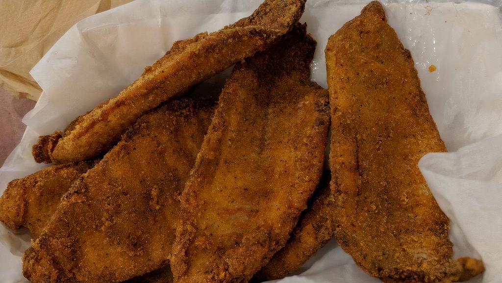 Fried Catfish Basket · 2 pieces. comes with Regular Fries, Cajun Fries, or Sweet Potato Fries