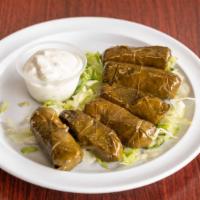 Dolma Plate · 6 grape leaves stuffed with rice, tomatoes, and lemon juice.