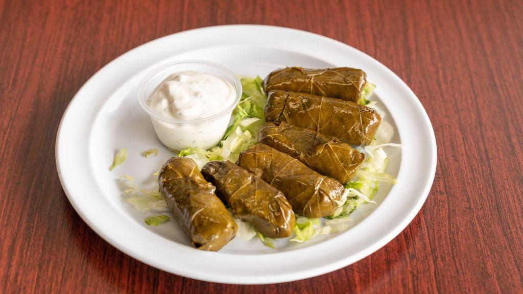 Dolma Plate · 6 grape leaves stuffed with rice, tomatoes, and lemon juice.