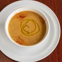 Lentil Soup · Red lentils mixed with onions and mediterranean spices.